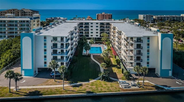 drone / aerial view with a water view and a city view