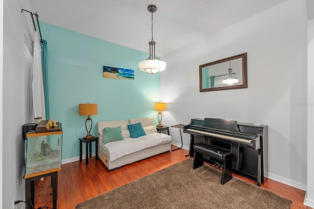 2539 Centennial Falcon Dr, Valrico, FL 33596 - sitting room with wood finished floors and baseboards