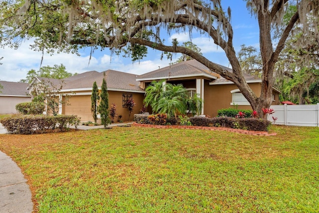 2539 Centennial Falcon Dr, Valrico, FL 33596 - view of front facade featuring stucco siding and an attached garage