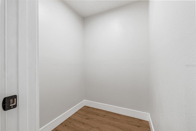 12641 98th St, Largo, FL 33773 - unfurnished room featuring baseboards and wood finished floors