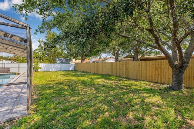 12641 98th St, Largo, FL 33773 - view of yard featuring a fenced backyard and a fenced in pool