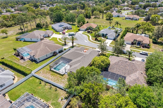 birds eye view of property with a residential view