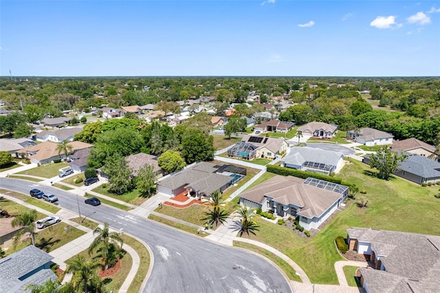 birds eye view of property with a residential view