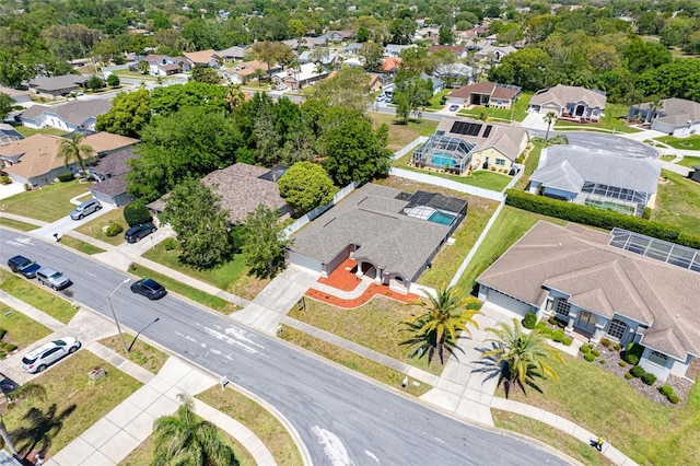 birds eye view of property with a residential view