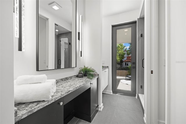98 W Davis Blvd, Tampa, FL 33606 - doorway to outside with tile patterned flooring and baseboards