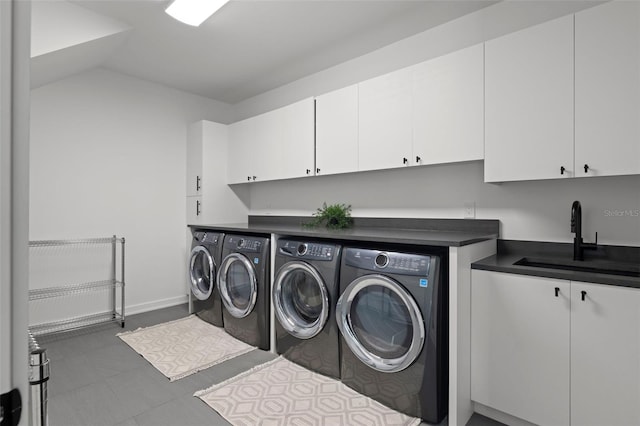 98 W Davis Blvd, Tampa, FL 33606 - clothes washing area with a sink, independent washer and dryer, cabinet space, and baseboards
