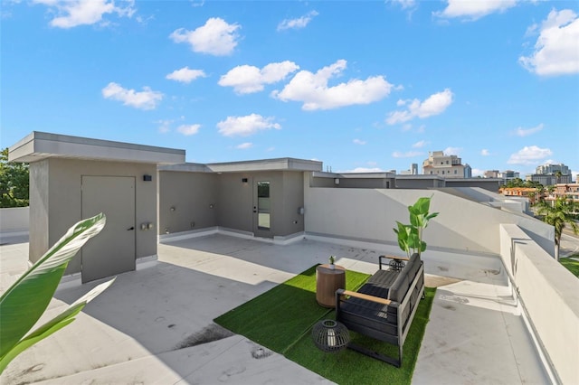 98 W Davis Blvd, Tampa, FL 33606 - view of front of house with a patio and stucco siding