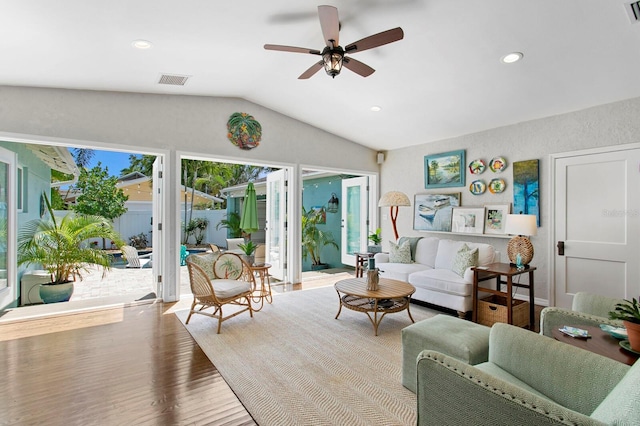 636 16th Ave NE, Saint Petersburg, FL 33704 - living area with visible vents, ceiling fan, wood finished floors, and lofted ceiling