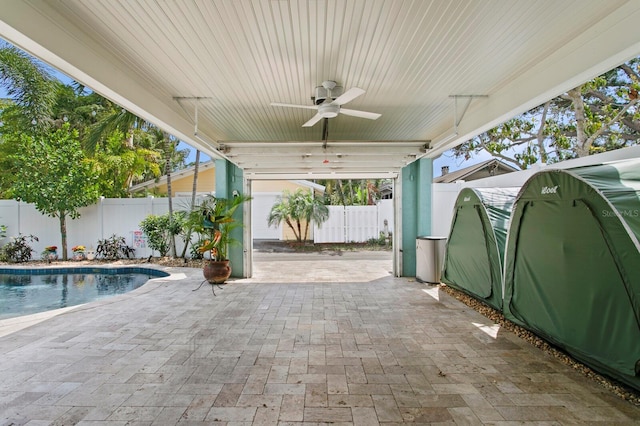 636 16th Ave NE, Saint Petersburg, FL 33704 - view of patio with a fenced in pool, a fenced backyard, and ceiling fan