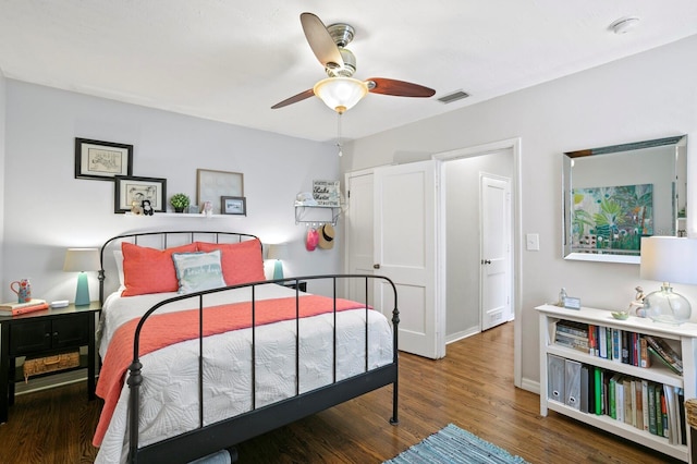 636 16th Ave NE, Saint Petersburg, FL 33704 - bedroom with wood finished floors, baseboards, a ceiling fan, and visible vents