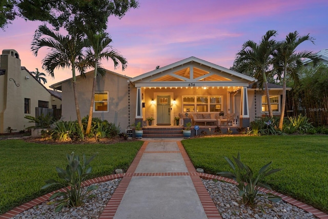 636 16th Ave NE, Saint Petersburg, FL 33704 - view of front of home with a porch and a front yard