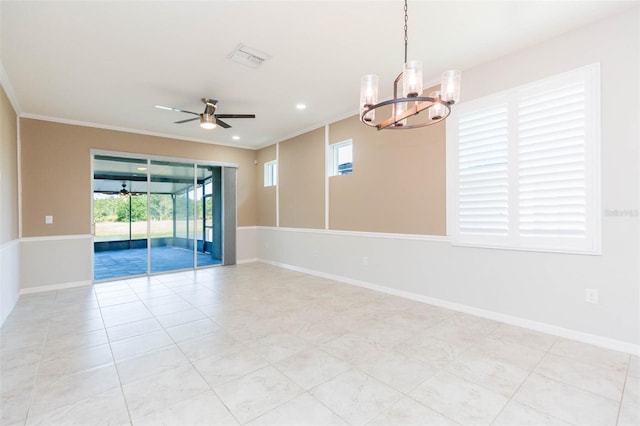 unfurnished room with ornamental molding, a wealth of natural light, baseboards, and ceiling fan with notable chandelier