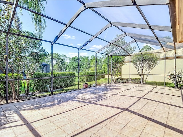 view of patio with a lanai