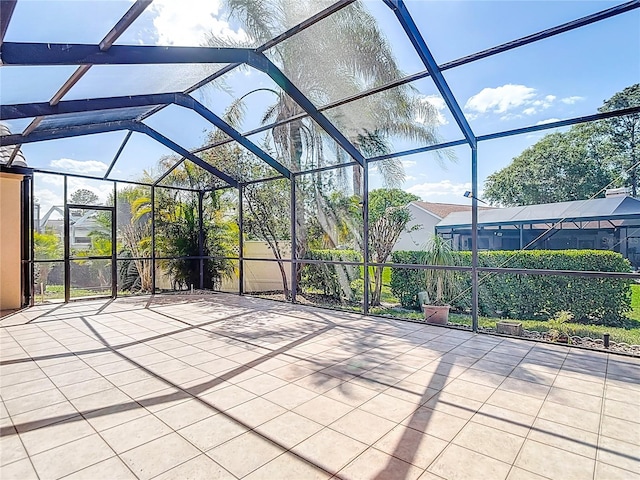 view of patio / terrace with a lanai