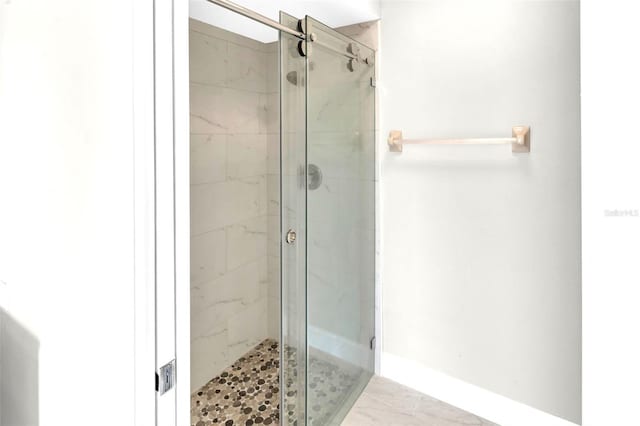 6994 Country Lakes Cir, Sarasota, FL 34243 - bathroom with a stall shower