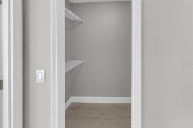 6994 Country Lakes Cir, Sarasota, FL 34243 - spacious closet with marble finish flooring