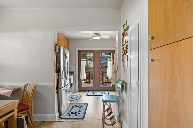 3120 8th Ave N, Saint Petersburg, FL 33713 - doorway to outside featuring french doors, a ceiling fan, baseboards, and light tile patterned floors
