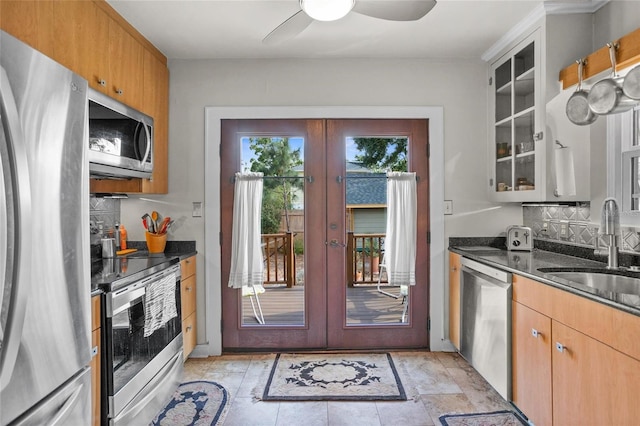 3120 8th Ave N, Saint Petersburg, FL 33713 - kitchen with stainless steel appliances, a sink, backsplash, and french doors