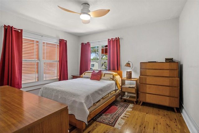 3120 8th Ave N, Saint Petersburg, FL 33713 - bedroom with wood finished floors, baseboards, and ceiling fan