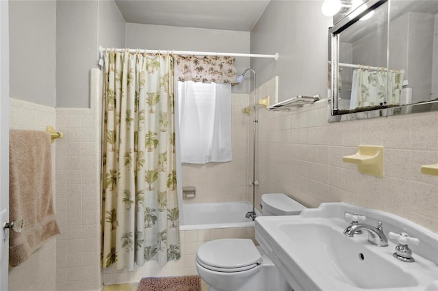 3120 8th Ave N, Saint Petersburg, FL 33713 - full bathroom with tile walls, a sink, tiled shower / bath, and toilet