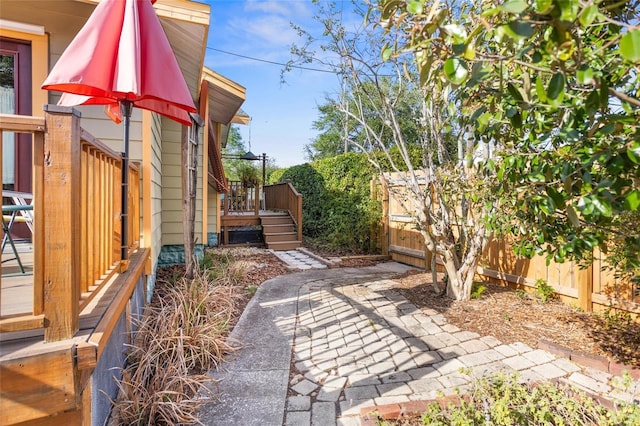 3120 8th Ave N, Saint Petersburg, FL 33713 - view of yard with a deck, stairs, and a patio