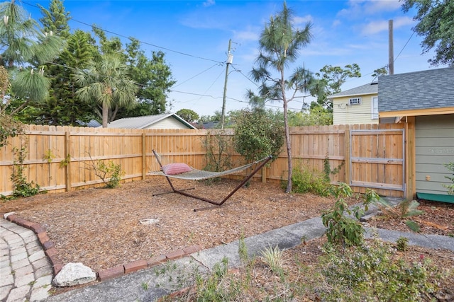 3120 8th Ave N, Saint Petersburg, FL 33713 - fenced backyard with a gate