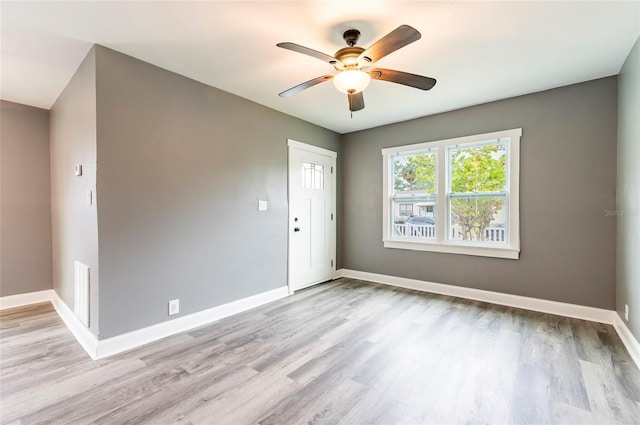 2017 Oceanview Pl, Tampa, FL 33605 - empty room with baseboards, light wood finished floors, ceiling fan, and visible vents