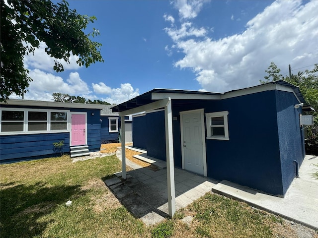 2017 Oceanview Pl, Tampa, FL 33605 - exterior space with a lawn and entry steps