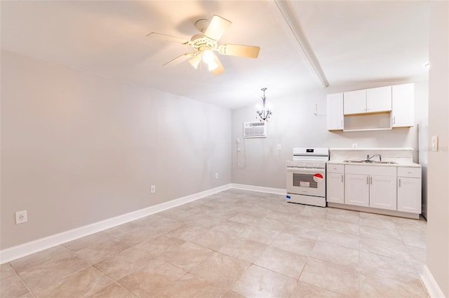 2017 Oceanview Pl, Tampa, FL 33605 - kitchen featuring white gas range oven, a sink, light countertops, ceiling fan with notable chandelier, and a wall mounted AC