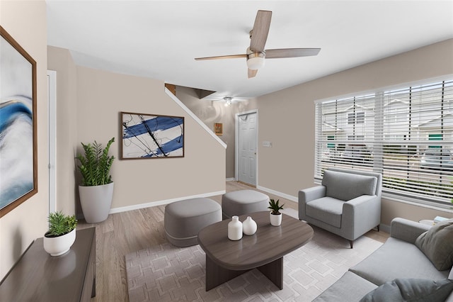 5503 67th Ave N Unit 18, Pinellas Park, FL 33781 - living area with wood finished floors, baseboards, and ceiling fan