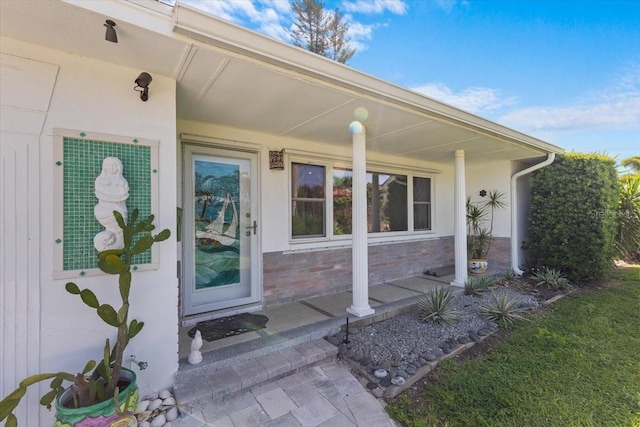 2540 S Shore Dr SE, Saint Petersburg, FL 33705 - doorway to property with covered porch