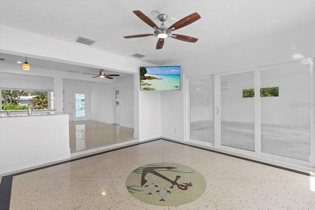 2540 S Shore Dr SE, Saint Petersburg, FL 33705 - empty room featuring baseboards, visible vents, and ceiling fan
