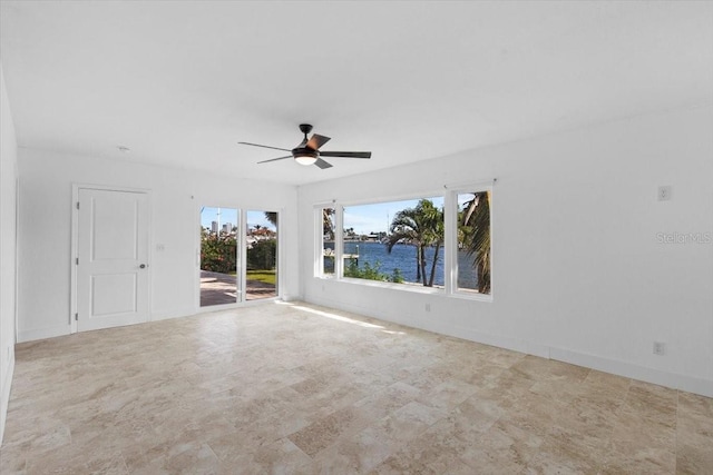 2540 S Shore Dr SE, Saint Petersburg, FL 33705 - unfurnished room featuring a ceiling fan and baseboards