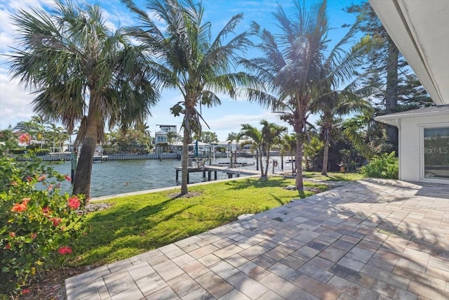 2540 S Shore Dr SE, Saint Petersburg, FL 33705 - view of patio featuring a water view and a dock