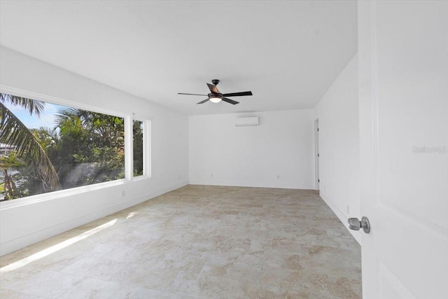 2540 S Shore Dr SE, Saint Petersburg, FL 33705 - empty room featuring a wall mounted air conditioner and ceiling fan