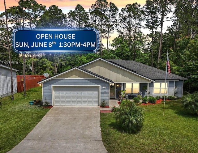 2720 N Screech Owl Ave, Saint Augustine, FL 32084 - view of front of property with concrete driveway, a garage, a shingled roof, and board and batten siding
