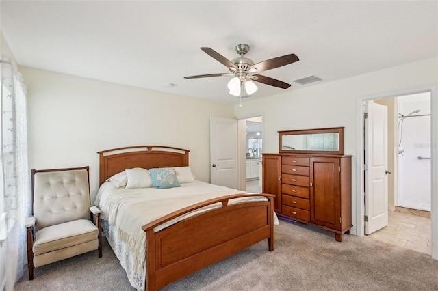 2720 N Screech Owl Ave, Saint Augustine, FL 32084 - bedroom featuring light carpet, ceiling fan, and ensuite bath