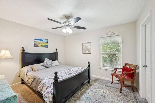 2720 N Screech Owl Ave, Saint Augustine, FL 32084 - bedroom with light carpet, baseboards, and a ceiling fan