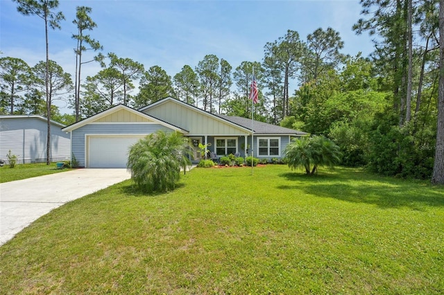 2720 N Screech Owl Ave, Saint Augustine, FL 32084 - ranch-style house with driveway, a garage, a front lawn, and board and batten siding
