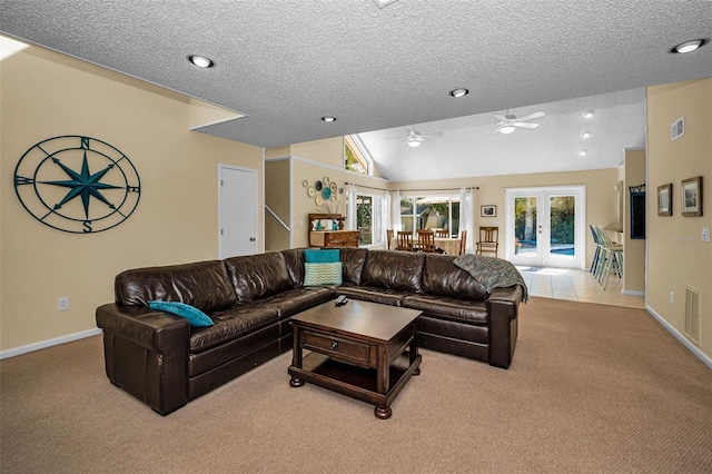 508 N Mayo St, Crystal Beach, FL 34681 - living room with french doors, carpet flooring, a ceiling fan, and vaulted ceiling