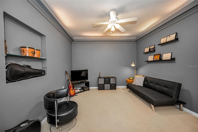 508 N Mayo St, Crystal Beach, FL 34681 - interior space with ceiling fan, a textured ceiling, baseboards, ornamental molding, and carpet