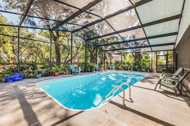 pool featuring a patio area and a lanai