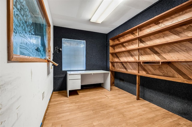 unfurnished office with light wood-style flooring