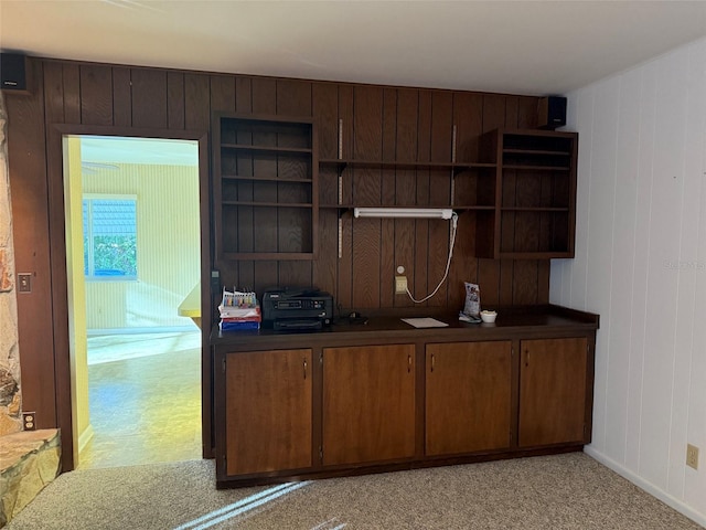 interior space featuring baseboards