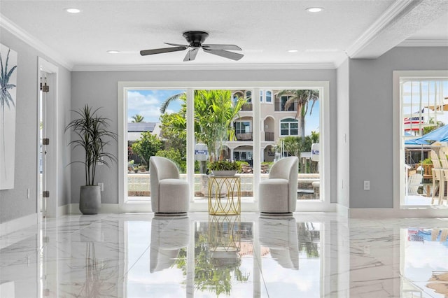 interior space with crown molding, a ceiling fan, marble finish floor, and recessed lighting