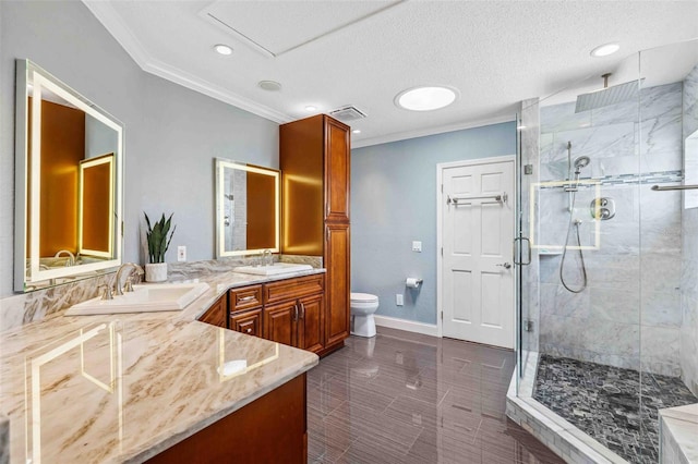 full bath with a sink, a stall shower, and ornamental molding
