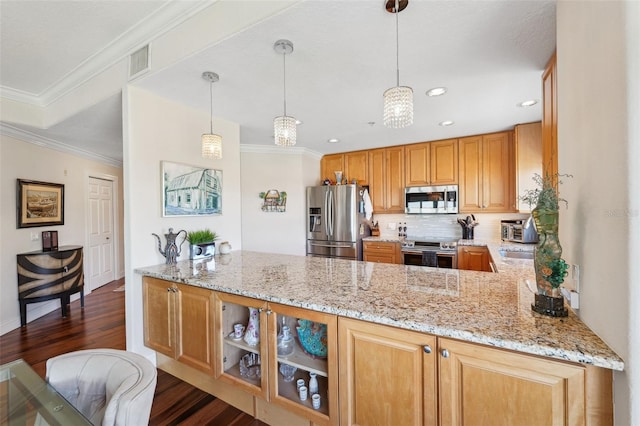 kitchen featuring light stone counters, appliances with stainless steel finishes, visible vents, dark wood-style flooring, and recessed lighting