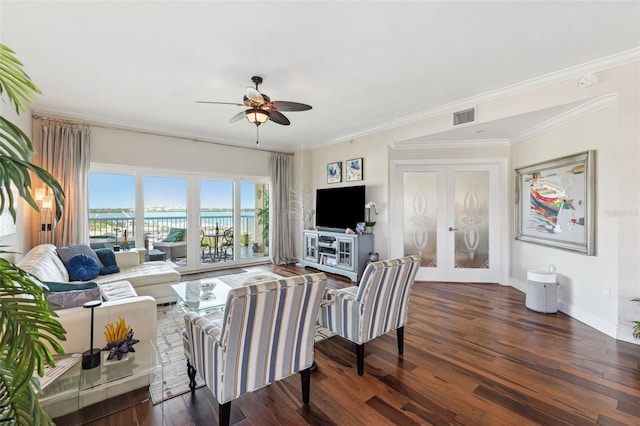 living room with a ceiling fan, visible vents, baseboards, french doors, and wood finished floors