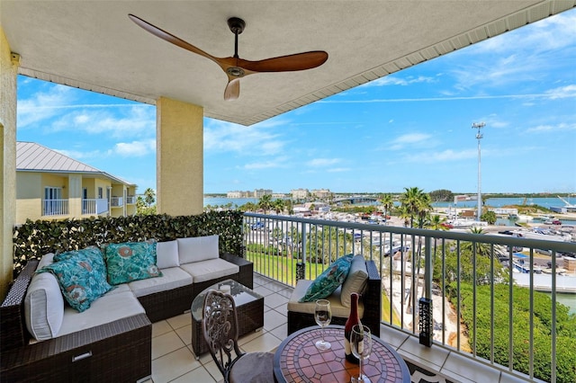 balcony featuring a ceiling fan and outdoor lounge area