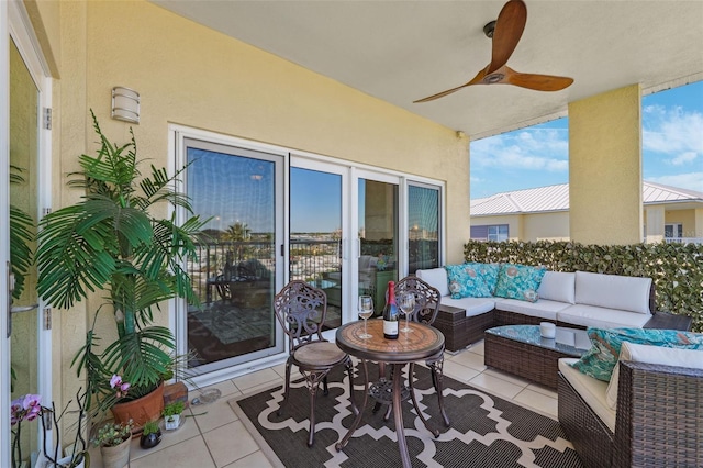 view of patio featuring an outdoor hangout area and a ceiling fan